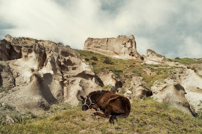 Photographer Petros Koublis describes the Santorini that he captures as the “equivalent of a dream”—which is exactly what it feels like to view his photographs—like looking through the lens of a dream.