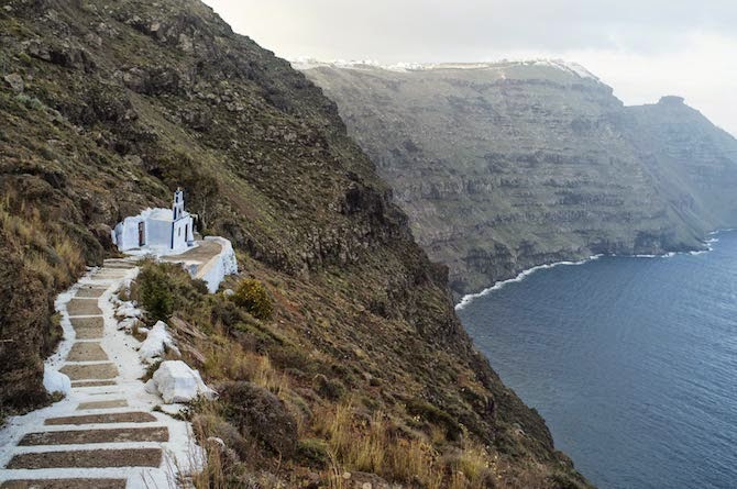 Photographer Petros Koublis describes the Santorini that he captures as the “equivalent of a dream”—which is exactly what it feels like to view his photographs—like looking through the lens of a dream.