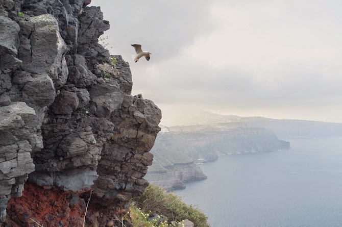 Photographer Petros Koublis describes the Santorini that he captures as the “equivalent of a dream”—which is exactly what it feels like to view his photographs—like looking through the lens of a dream.