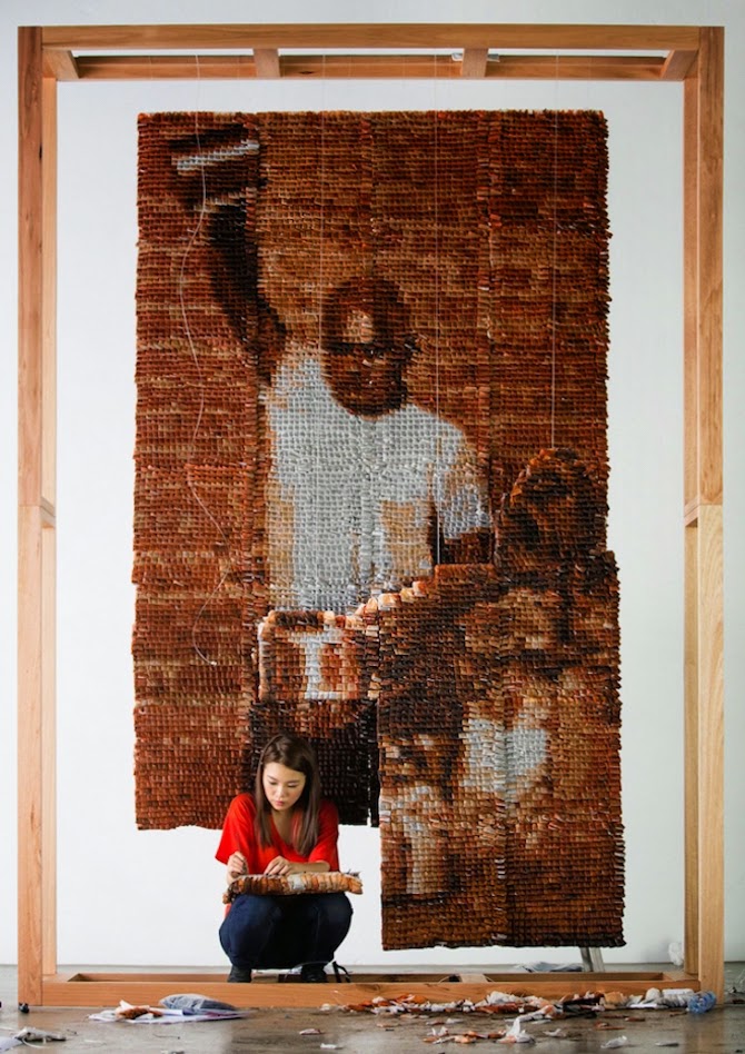 Artist Red Hong Yi used 20,000 stained tea bags to create an amazing portrait of a "Teh Tarik man", a man preparing a traditional Malaysian tea.