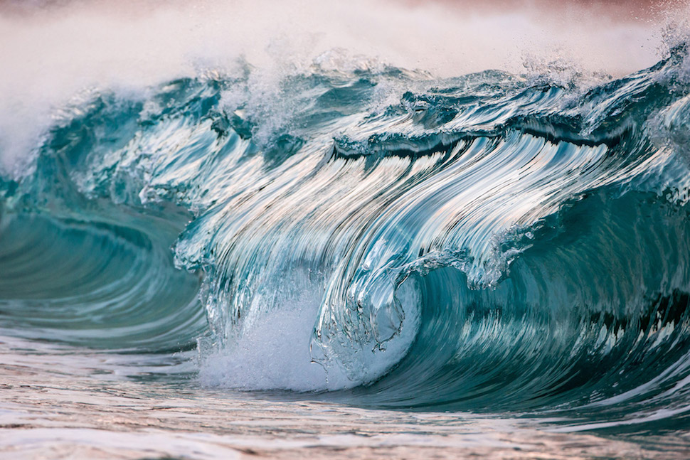 In his poetic photography series called “AquaViva,” photographer Pierre Carreau aims to depict the powerful energy of the oceans waves.